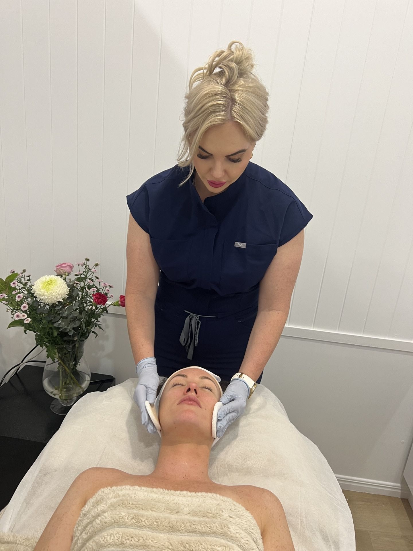 Woman Receiving a Facial Treatment — Bombshell Body Bar In Meikleville Hill, QLD
