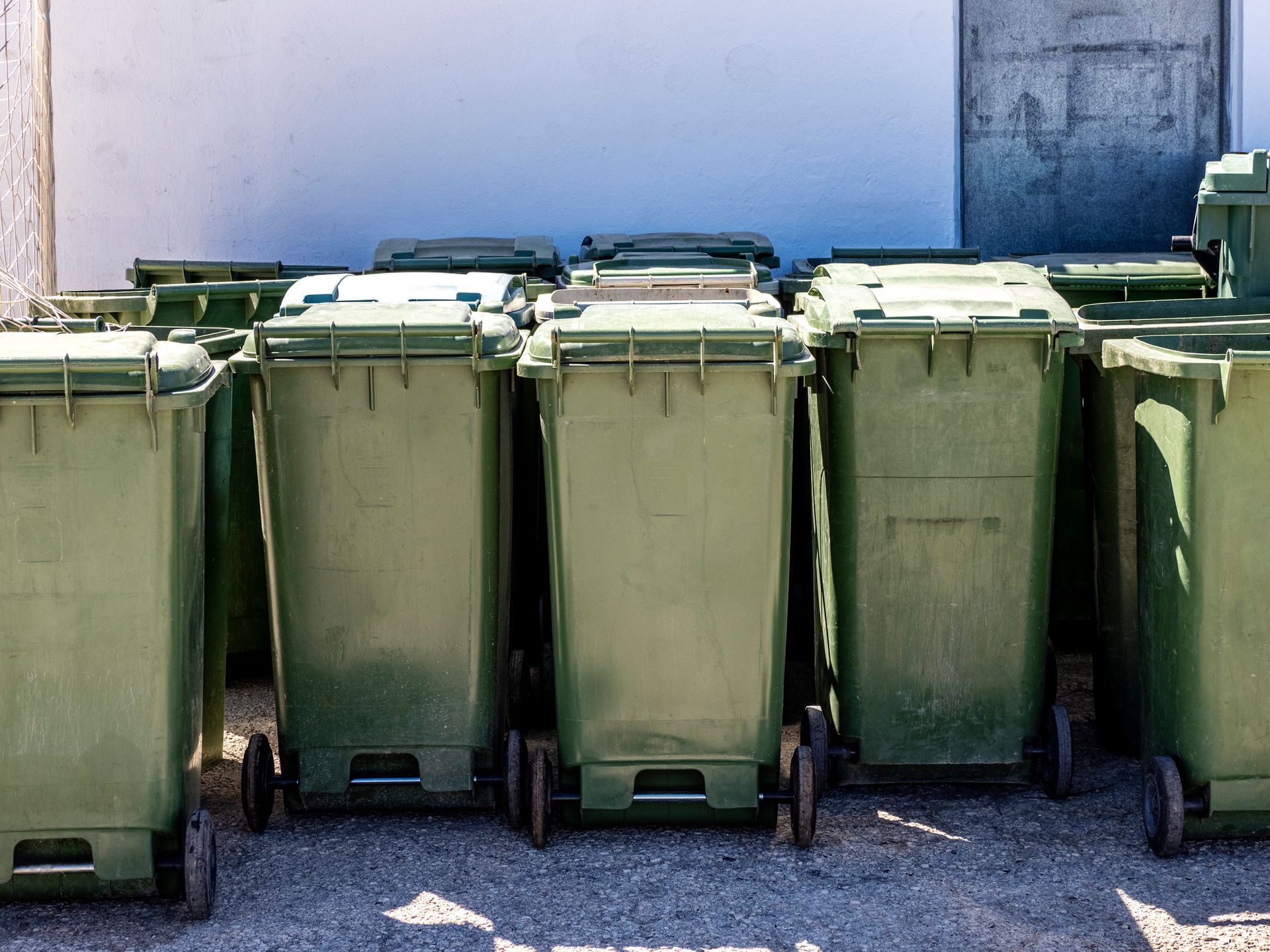 Group of garbage containers on the street – Riverview, FL – A Plus Bin Cleaning and More