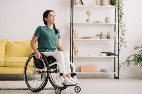 Smiling Disabled Woman While Sitting In Wheelchair — Camarillo, CA — Merlin Medical Supply