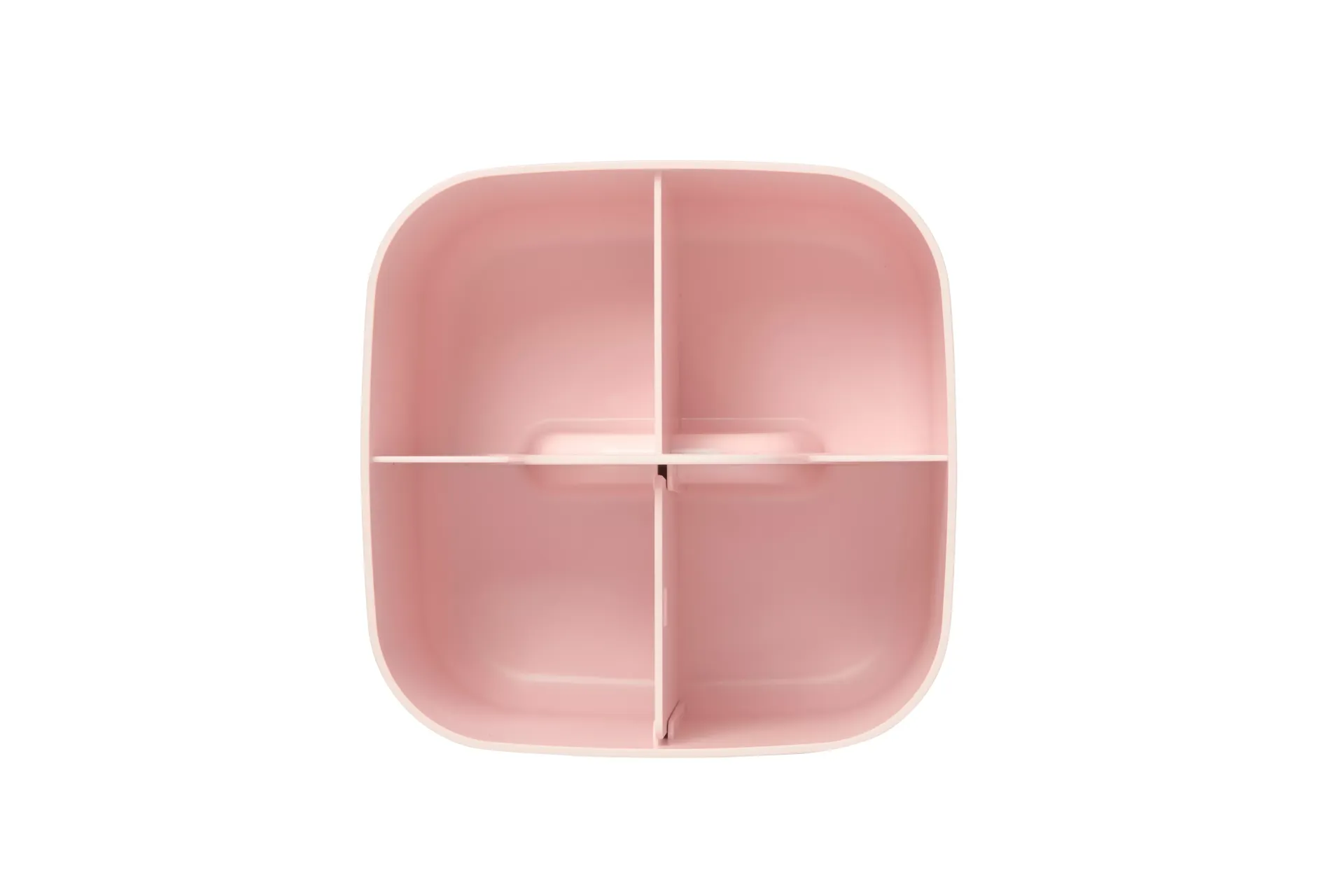 Un recipiente de plástico rosa con cuatro compartimentos sobre un fondo blanco.