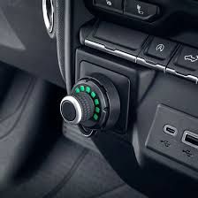 A close up of a steering wheel in a car.