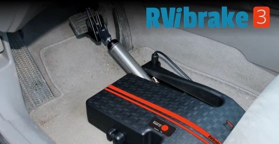 A rvbrake 3 device is sitting on the floor of a car