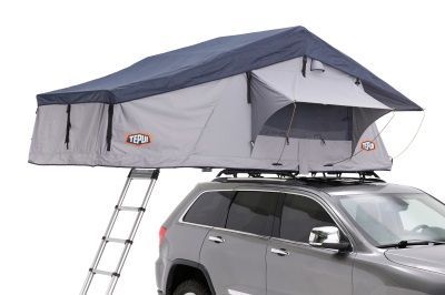 A car with a tent on top of it.