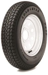 A load star tire with a white rim on a white background