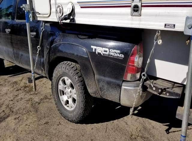 A black truck with the word trd on the side