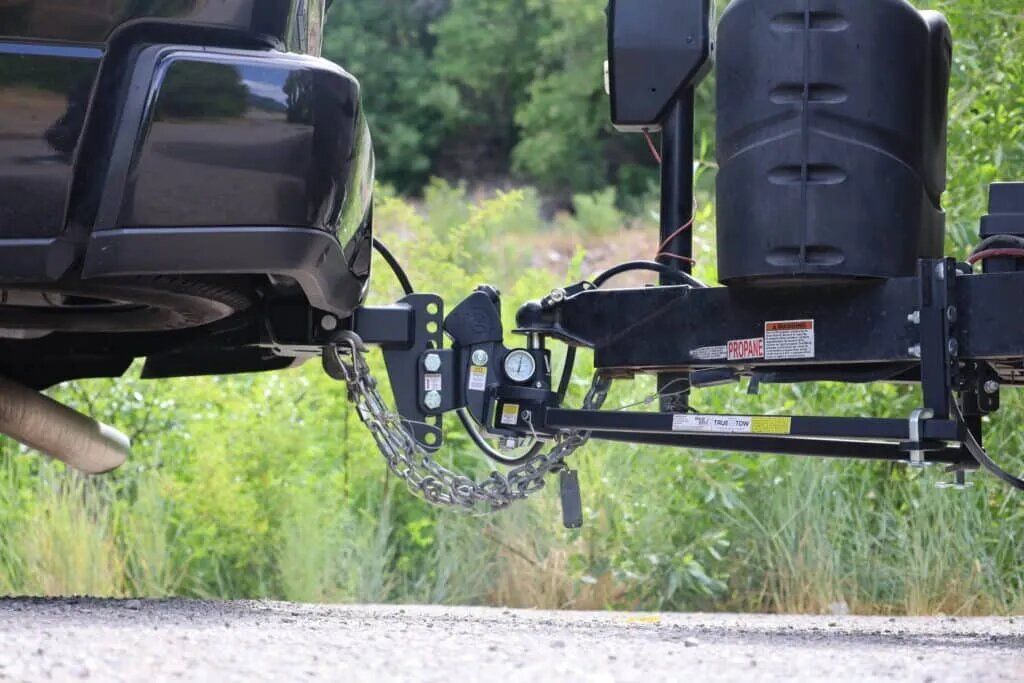 A truck towing a trailer littleton colorado Benefits of Weight Distribution Hitches