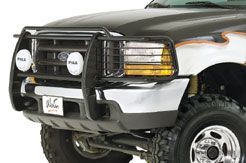 A black and white truck with a bumper protector on it.