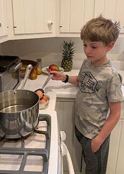 A boy cooking