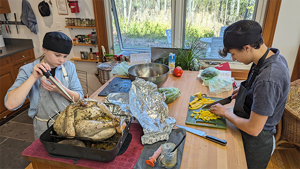 Adolescents in the Montessori Secondary Level prepare a full Thanksgiving meal for their classmates