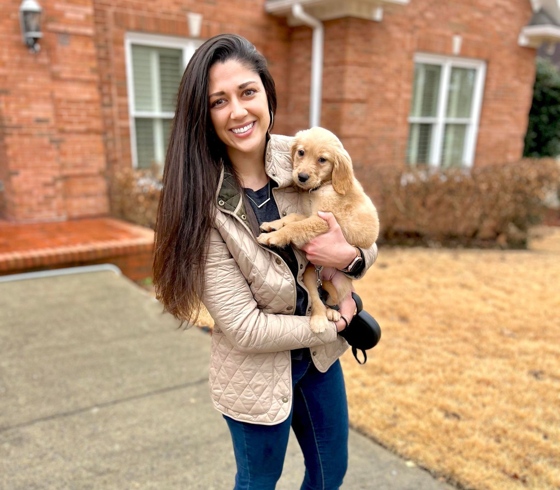 Photo of Dr. Syed and her puppy