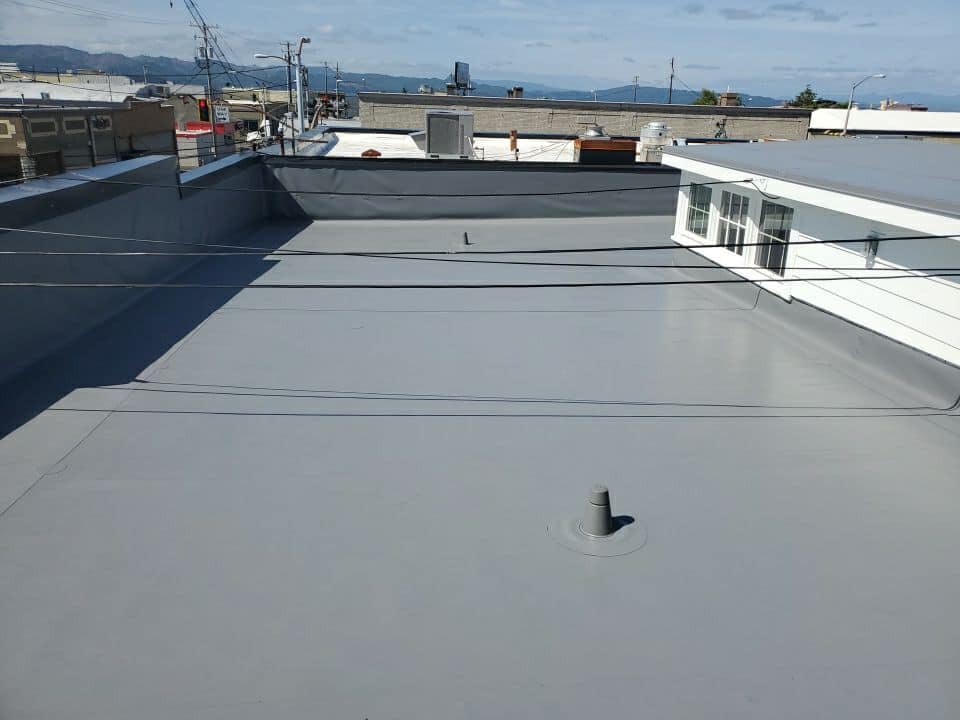 PVC Flat Roof of Commercial Building — Astoria, OR — Northwest Roofing & Construction LLC