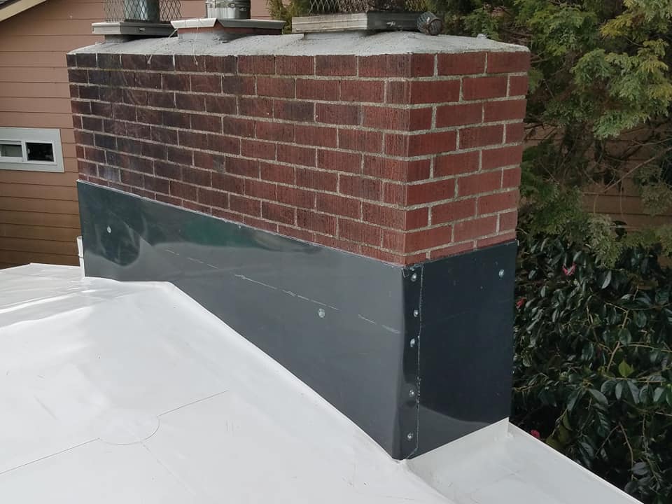 Metal Cover on the Chimney After — Astoria, OR — Northwest Roofing & Construction LLC