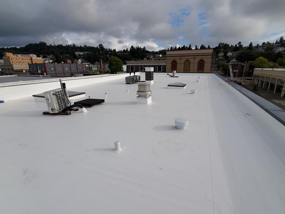 Top of the Building — Astoria, OR — Northwest Roofing & Construction LLC