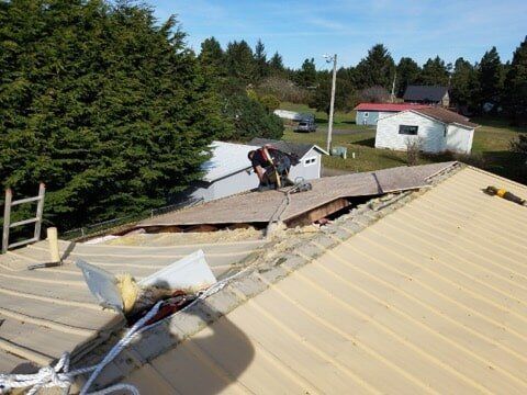 Beige Metal Roof Before — Astoria, OR — Northwest Roofing & Construction LLC