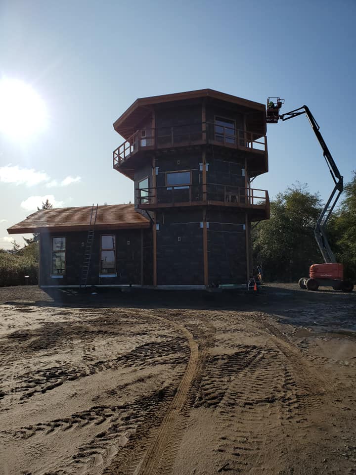 Black House with Wooden Roof — Astoria, OR — Northwest Roofing & Construction LLC