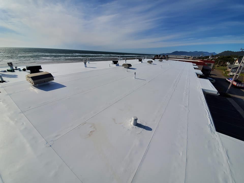 Farther View of White Rooftop — Astoria, OR — Northwest Roofing & Construction LLC