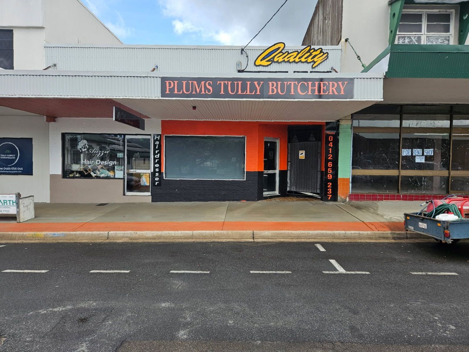 A Plums Tilly Butchery is Located on the Corner of a Street — DJ's Pressure Cleaning In Carruchan, QLD