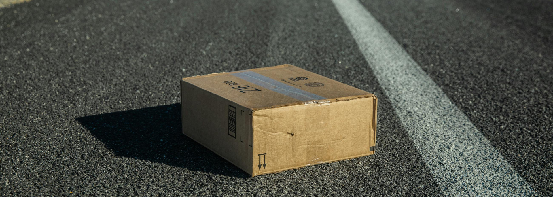 Picture of a box on the road. 