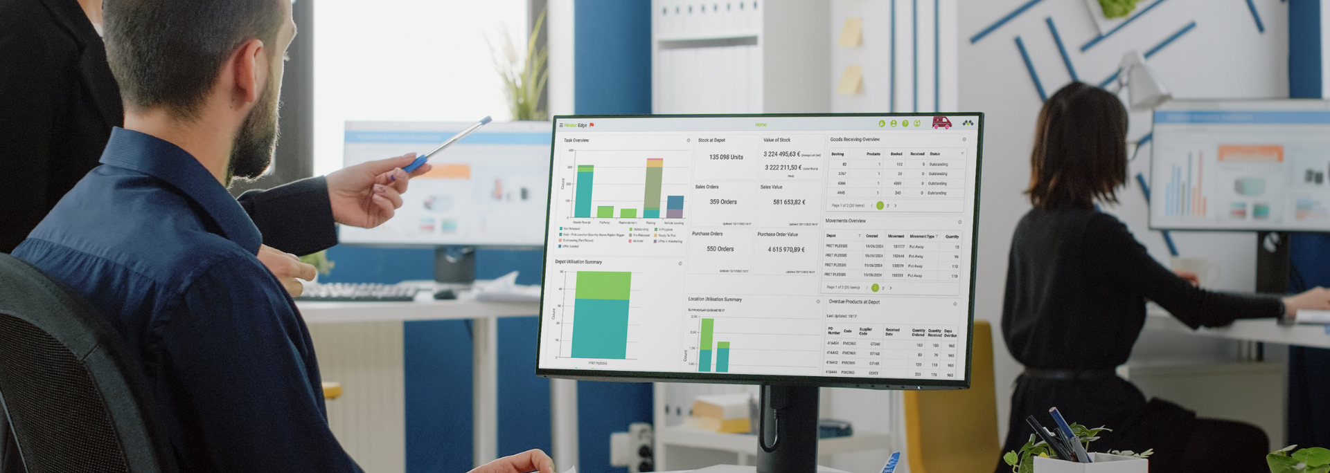 Picture of a businessperson examining data on a computer. 