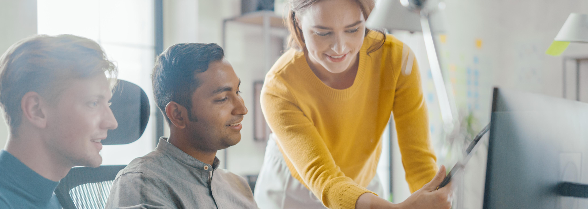 Picture of people working in an office. 