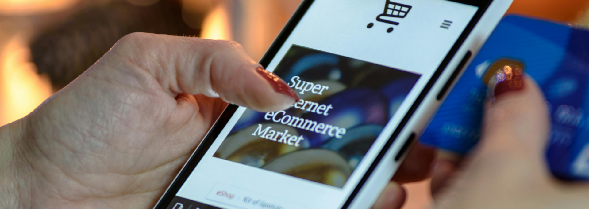 Picture of a person on a phone looking at a website. 