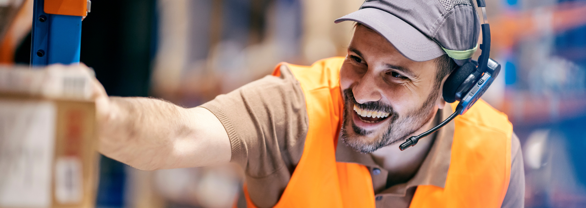 Picture of a warehouse worker using voice picking technology. 