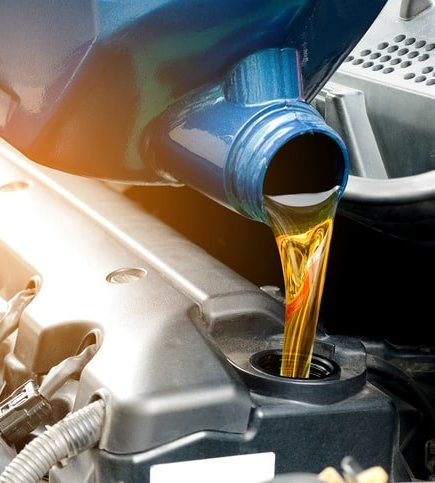 Oil Change ─ Pouring Oil in Dayton, OH Oil Change ─ Pouring Oil in Dayton, OH