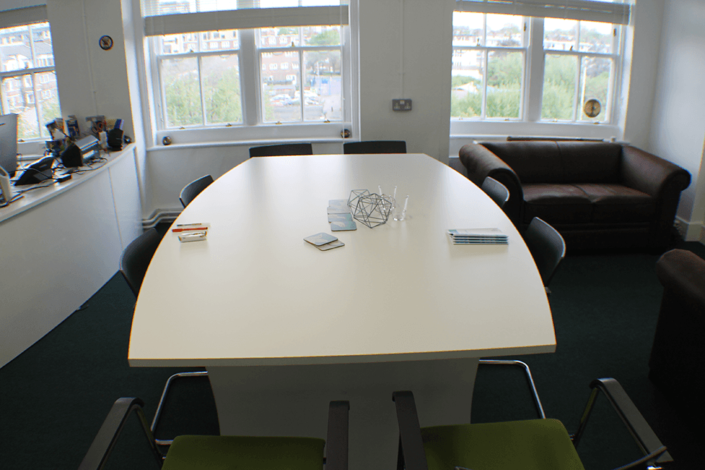 wooden table in meeting room