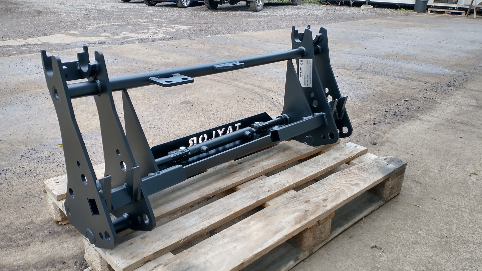 A piece of metal is sitting on a wooden pallet