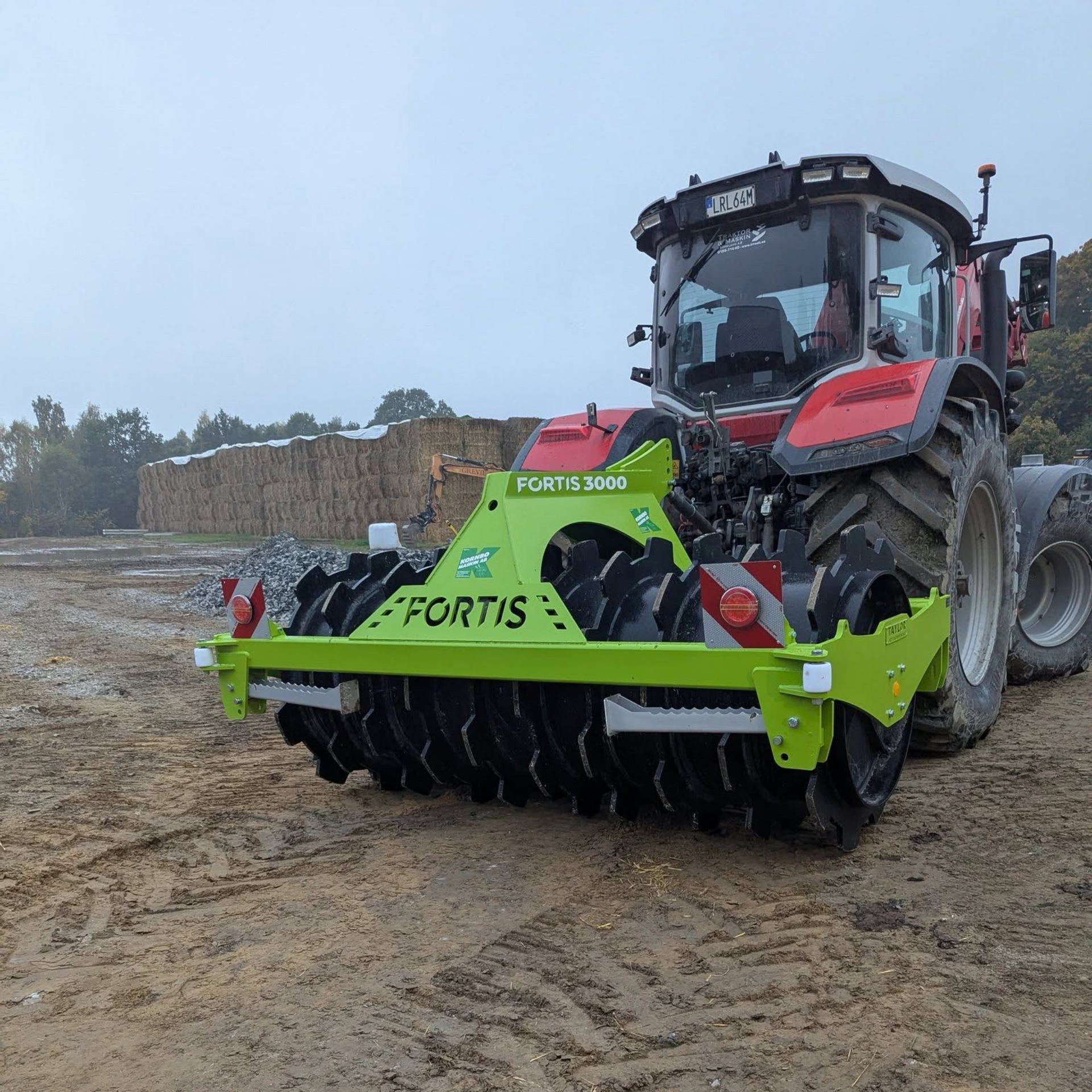 Fortis silage compactor on the back of a tractor
