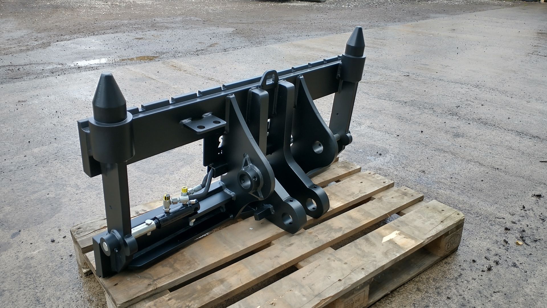 A piece of metal is sitting on top of a wooden pallet.