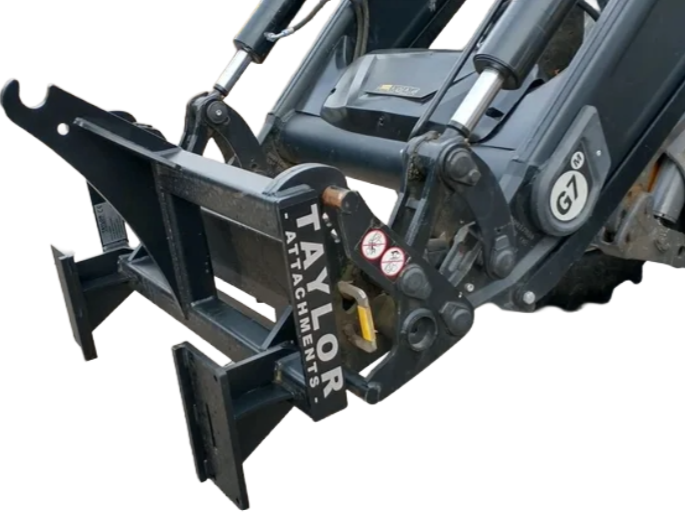 A close up of a tractor with the word taylor on it