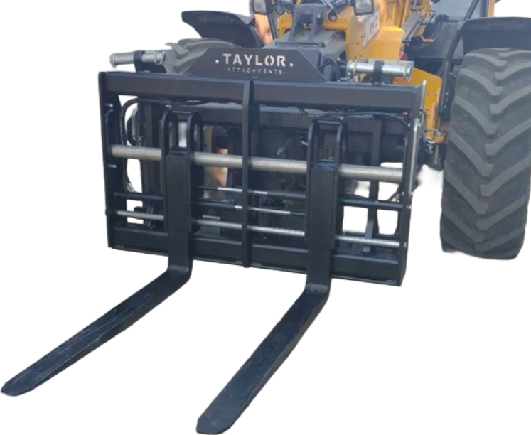 A tractor with a taylor forklift attached to it