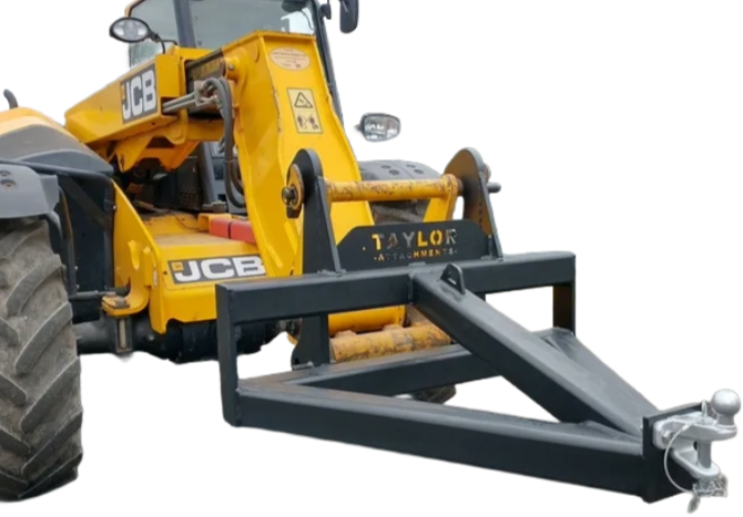 A yellow jcb tractor with a trailer attached to it