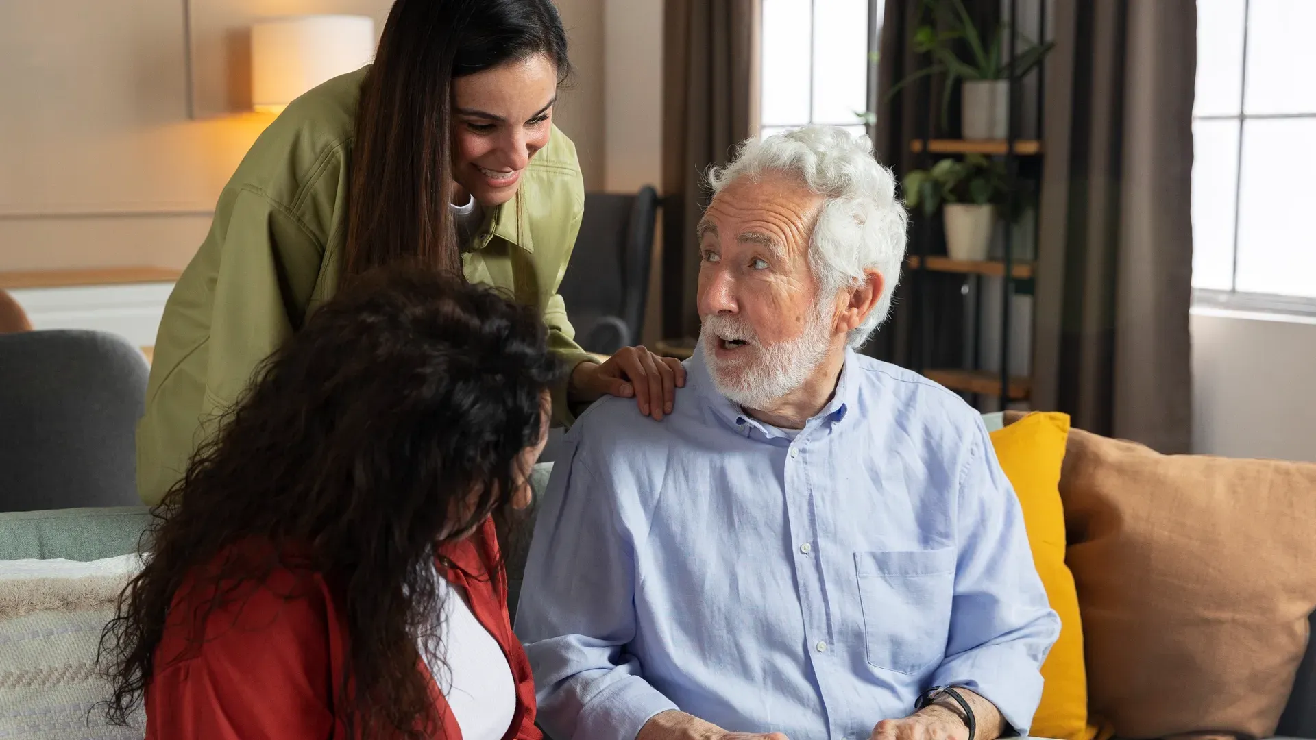 seniors with care worker at home