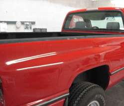 Rear View of Red Pickup Truck