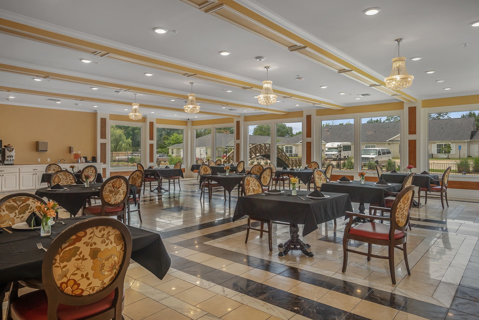 A large dining room filled with tables and chairs.