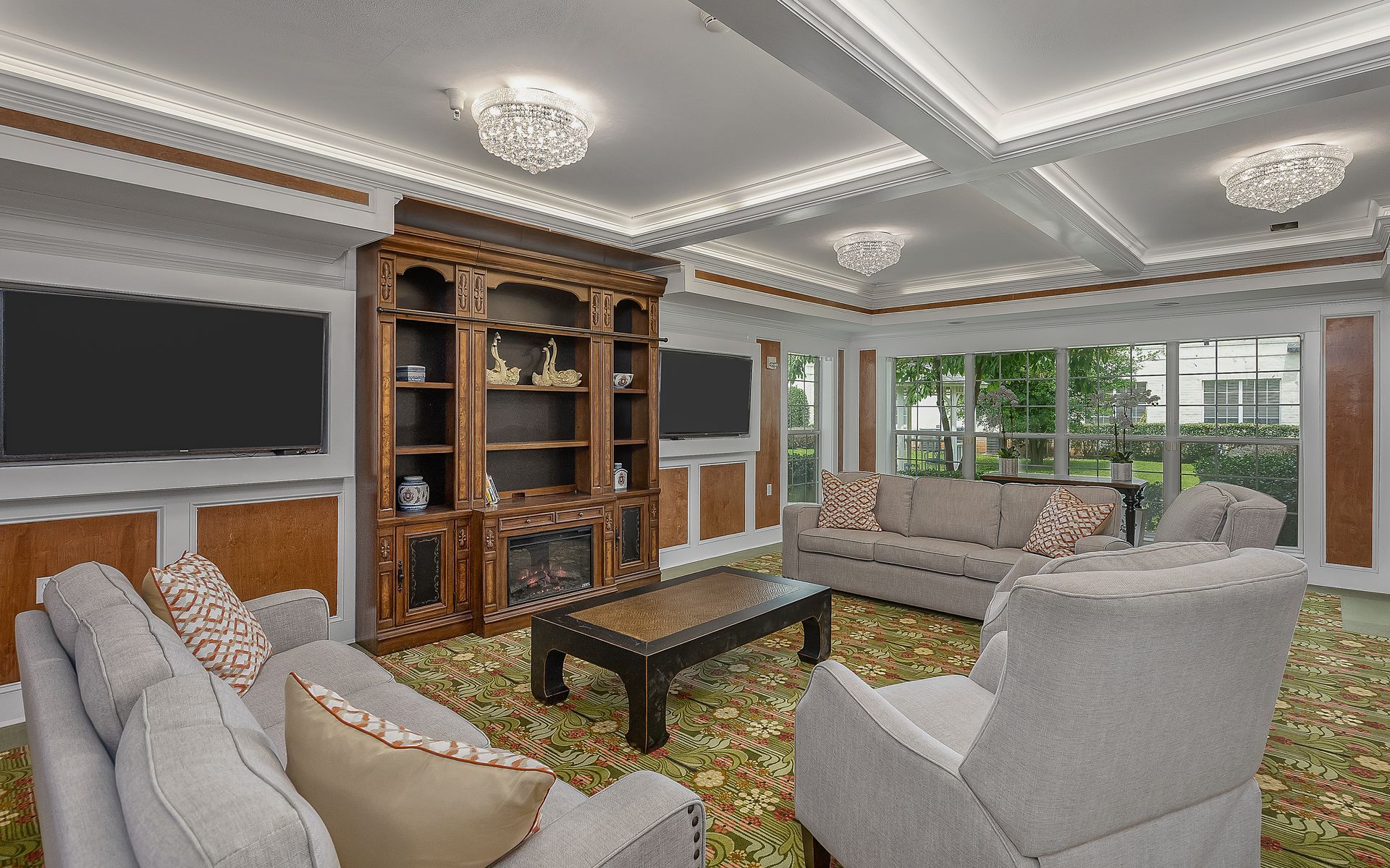 A living room filled with furniture and a fireplace.