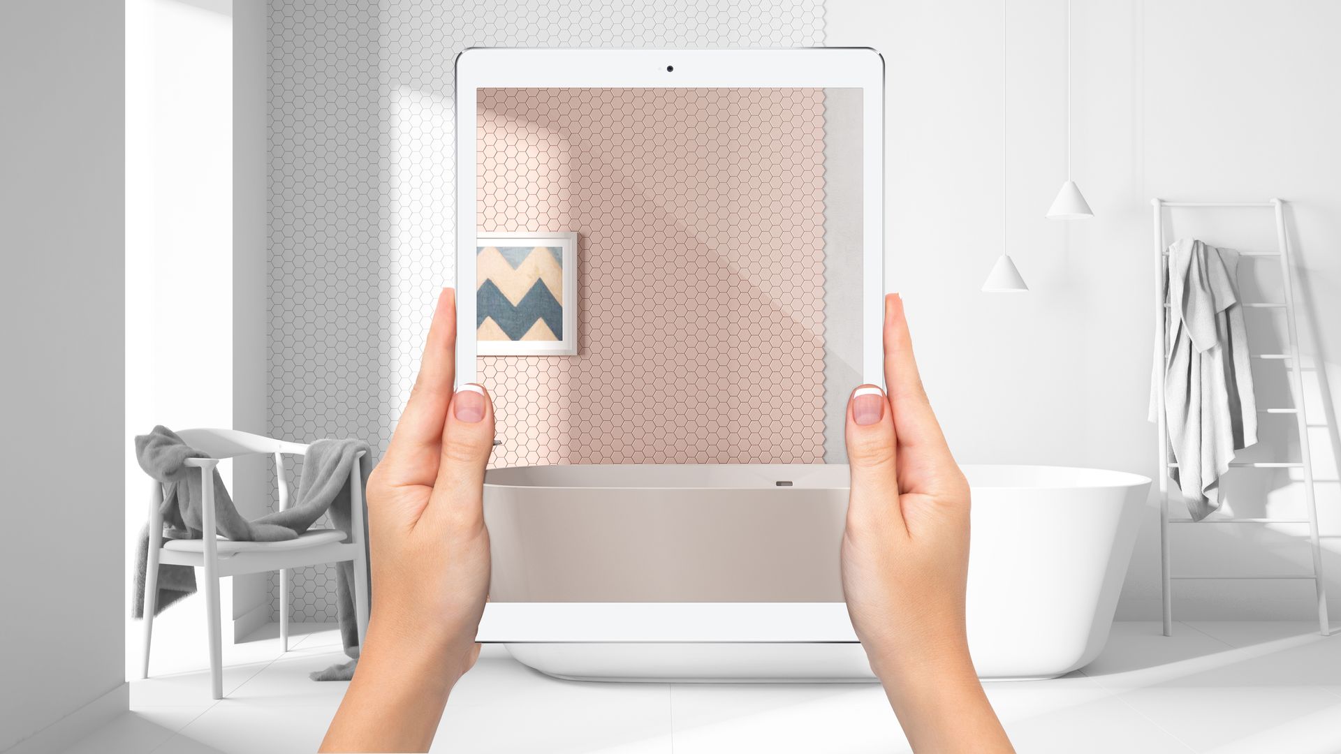 Hands holding a tablet showing a bathroom design preview, comparing tile styles in a modern interior. Hands holding a tablet showing a bathroom design preview, comparing tile styles in a modern interior.