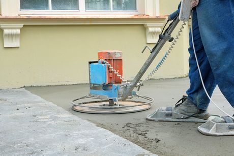 someone doing concrete floor polishing