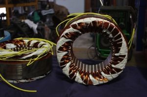 Two electric motors are sitting on a table.