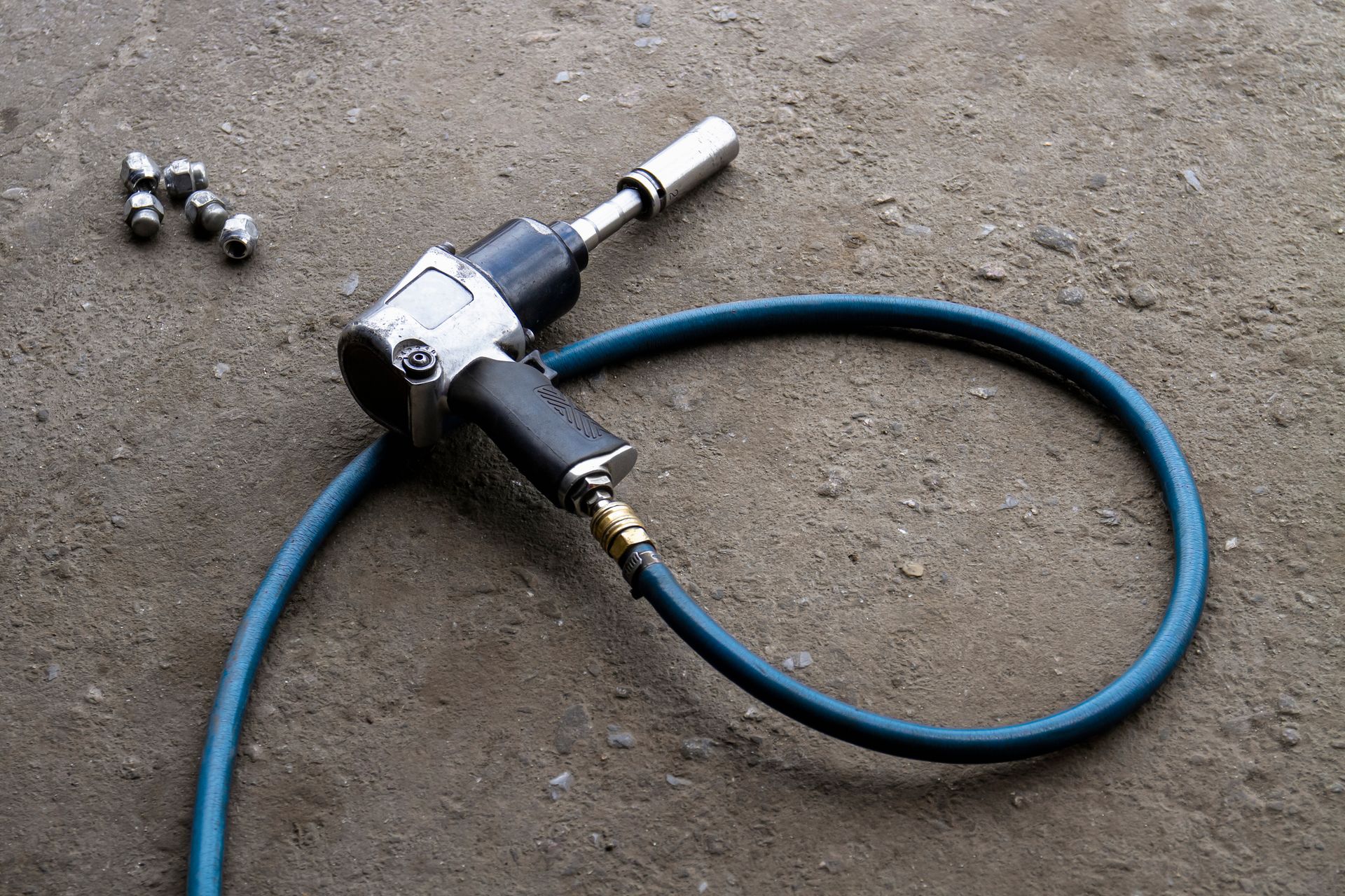 A person is cutting a piece of stone with a grinder.