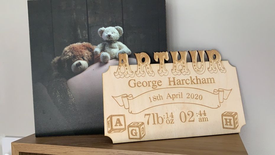New born wooden sign with the name on