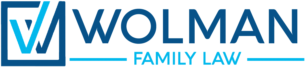 A blue and white logo for wolman family law