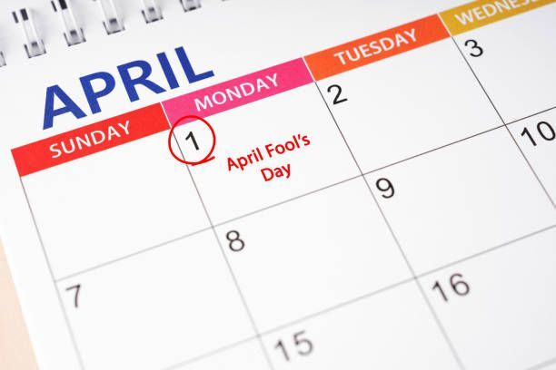 A close-up of an April calendar page with April 1st circled in red and labeled