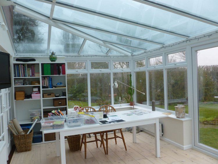 shelves and bookcase inside the conservatory