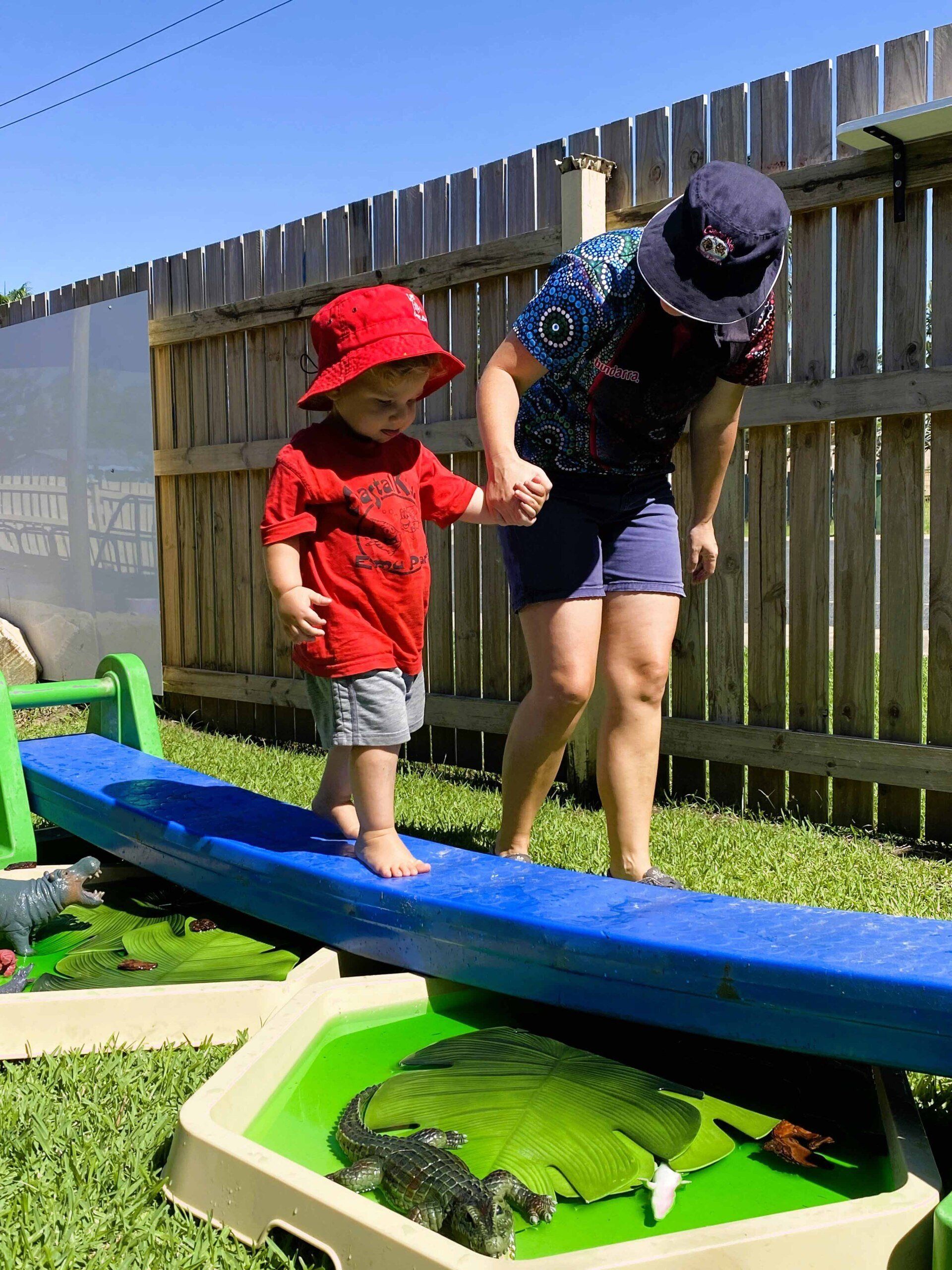 Toddlers Playing Animal Toys — Emu Park, QLD — Coastal Kids