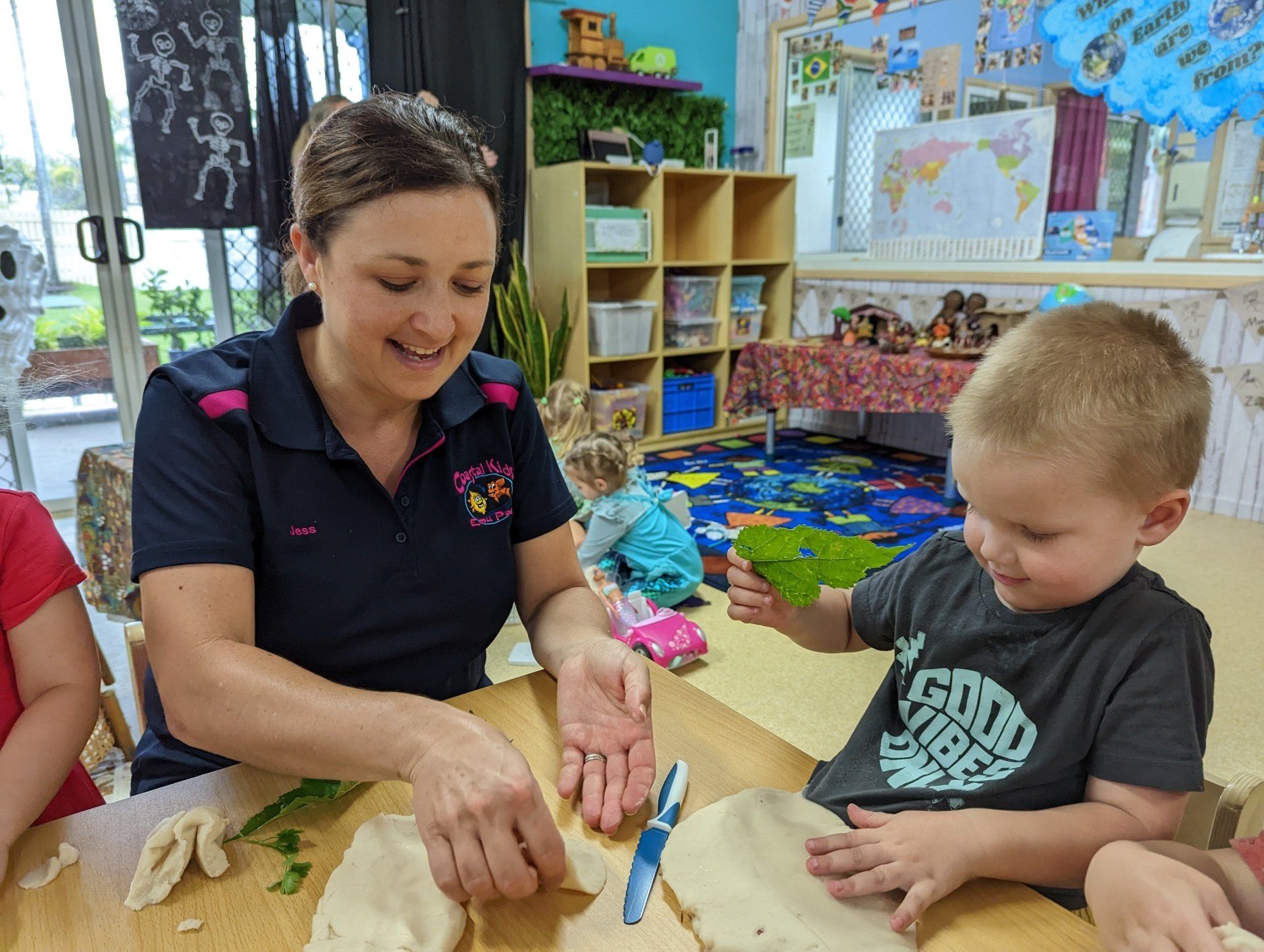Teacher and Pre-Kindy Boy Playing — Emu Park, QLD — Coastal Kids