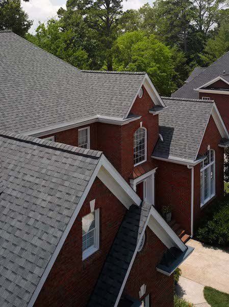 Architectural Asphalt Shingle Residential Roof  in Colonial Slate with new White Trim wrap and gutters