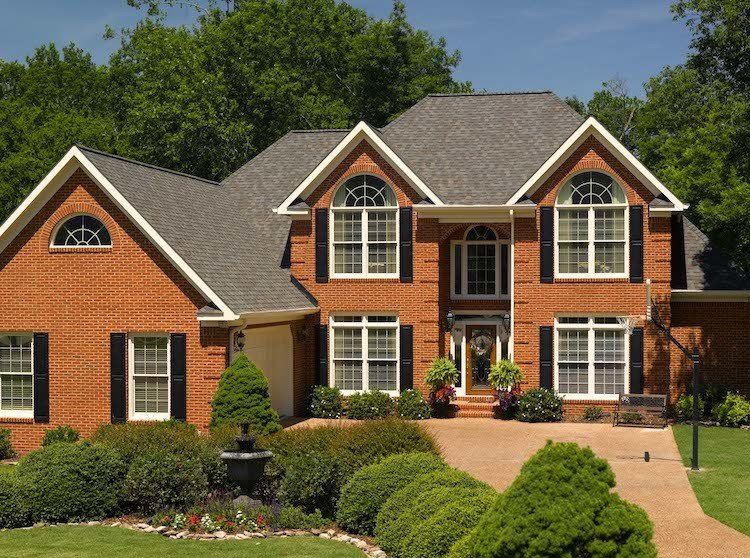 Residential 2 story house with new Driftwood Asphalt Architectural Shingle Roof